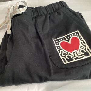 Pre-owned. Keith Haring Womens black fleece lined pants with tie waist.